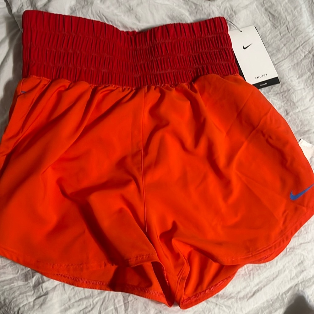 Nike running shorts size small red and orange